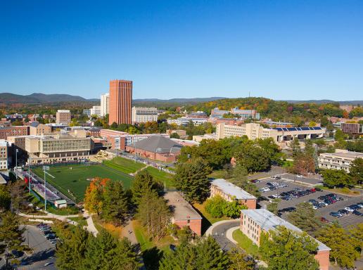 Aerial view of campus with library on the horizon