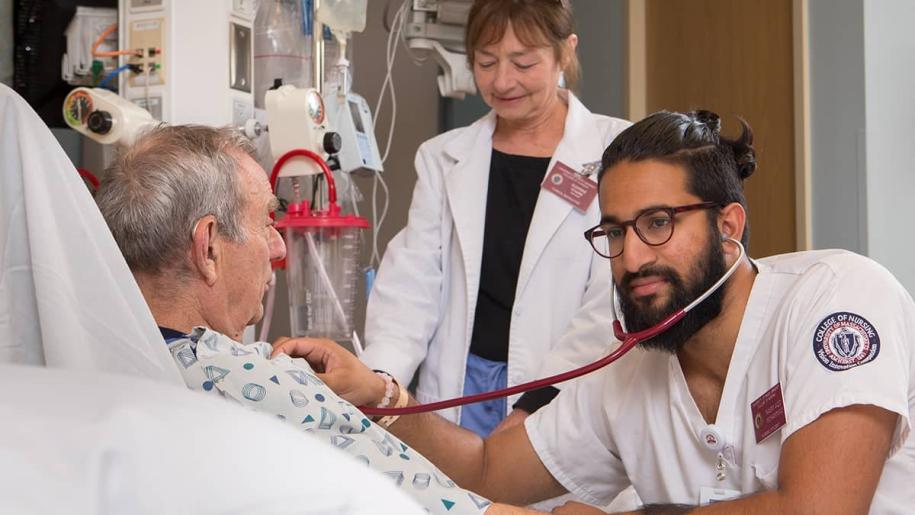 Student nurse caring for patient